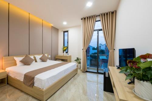 Giường trong phòng chung tại Hoai River Hoi An Homestay