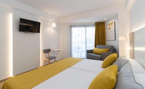 Postel nebo postele na pokoji v ubytování Medplaya Hotel Rio Park