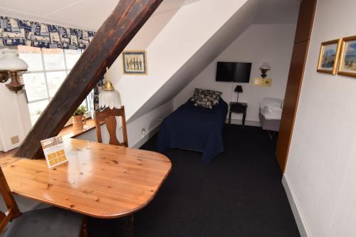 Televisyen dan/atau pusat hiburan di Danhostel Frederikshavn City