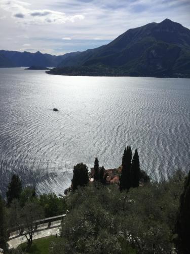 a large body of water with a boat in it at Casa Ninou in Domaso