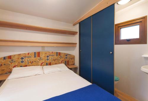 Posteľ alebo postele v izbe v ubytovaní Camping Village Poljana