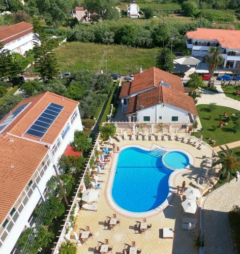 an aerial view of a resort with a swimming pool at Konstantina Apartments in Kavos
