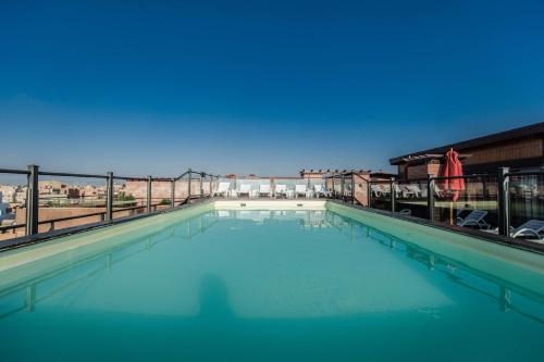 Bazén v ubytování Hotel Almas nebo v jeho okolí