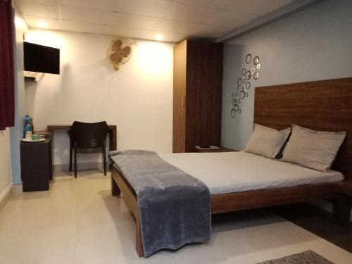 Postel nebo postele na pokoji v ubytování Tranquil Serviced Apartments