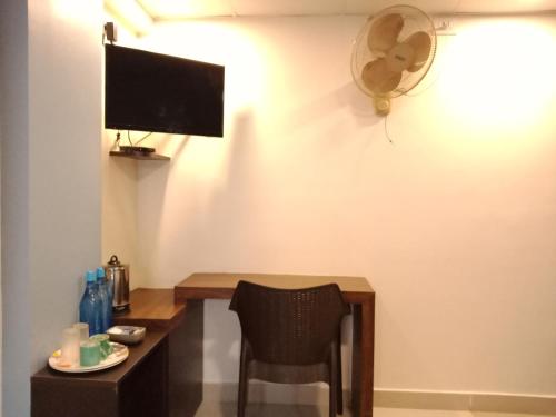 TV a/nebo společenská místnost v ubytování Tranquil Serviced Apartments