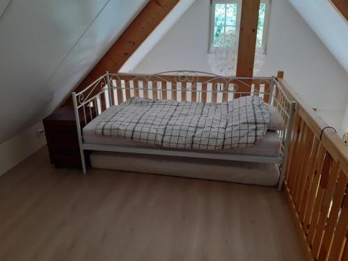 Postel nebo postele na pokoji v ubytování Zeeuws Huisje Colijnsplaat