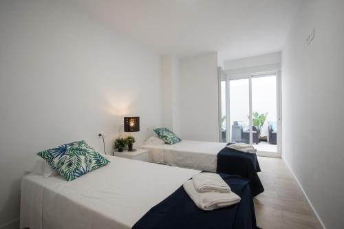 Posteľ alebo postele v izbe v ubytovaní Stylish *NEW* Apartment in Alicante w/ 4 bedrooms