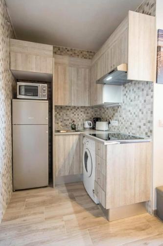 Virtuvė arba virtuvėlė apgyvendinimo įstaigoje Apartamento Hidalgo