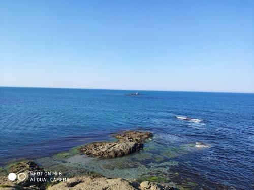 a small island in the middle of the ocean at INESA in Tsarevo