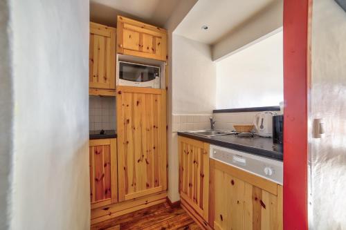 Kuchyň nebo kuchyňský kout v ubytování Residences Quartier Falaise - maeva Home