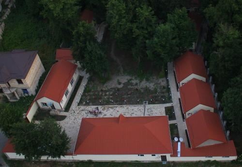an overhead view of a building with red roofs at Selena in Qusar