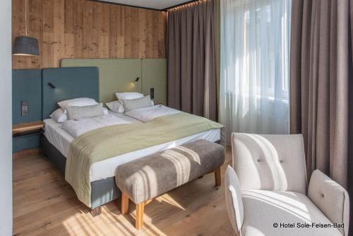 En eller flere senge i et værelse på Hotel Sole-Felsen-Bad