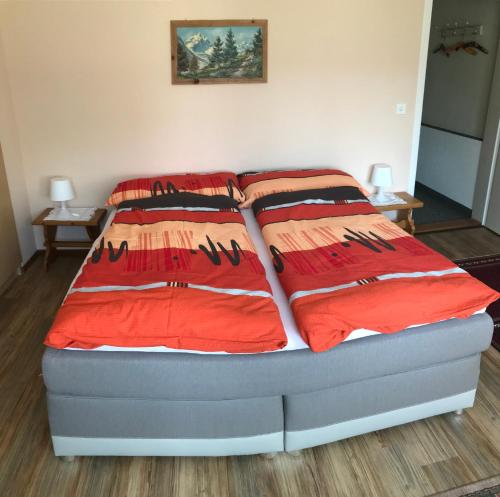Postel nebo postele na pokoji v ubytování Am Ufer