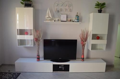 Μια τηλεόραση ή/και κέντρο ψυχαγωγίας στο Appartement romantique l'EVASION