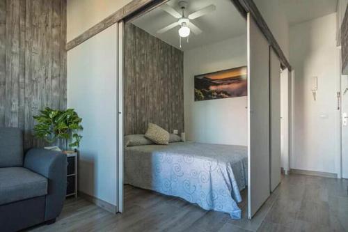 Apartamento Hidalgo tesisinde bir odada yatak veya yataklar