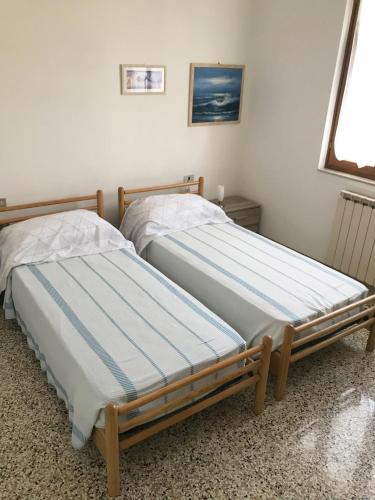 Postel nebo postele na pokoji v ubytování Casetta Rosada