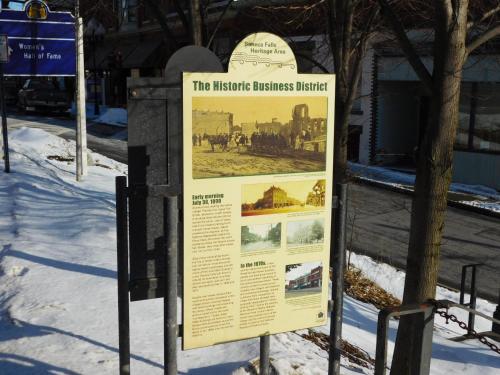 a sign in the snow next to a street at The Gould Hotel in Seneca Falls
