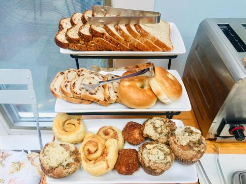 a display of different types of pastries in a bakery at Sesuit Harbor House in East Dennis