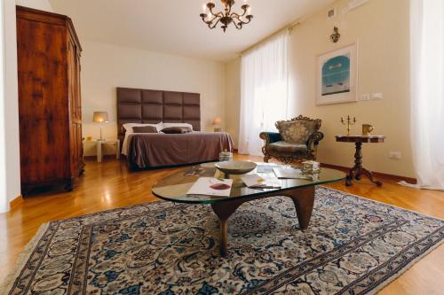 Postel nebo postele na pokoji v ubytování Exclusive Aparthotel La Reunion