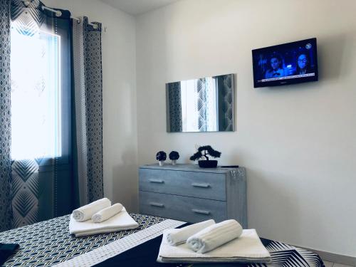TV/trung tâm giải trí tại Il Tramonto Luxury House