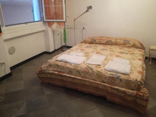 Un pat sau paturi într-o cameră la San Matteo Studio