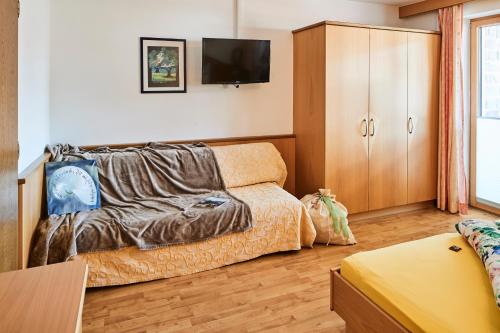 Un ou plusieurs lits dans un hébergement de l'établissement DAS EDELWEISS - Apartment Kuprian