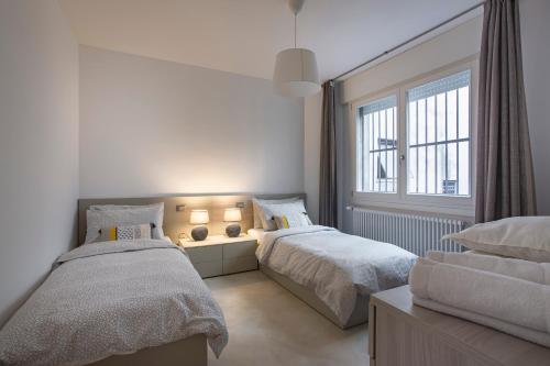 Posteľ alebo postele v izbe v ubytovaní C-Apartment Zabarella terrace