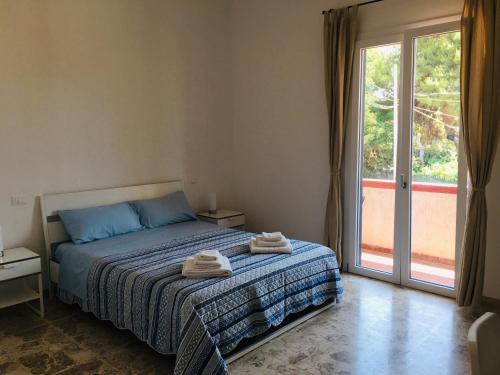 Llit o llits en una habitació de Villa Iavernaro