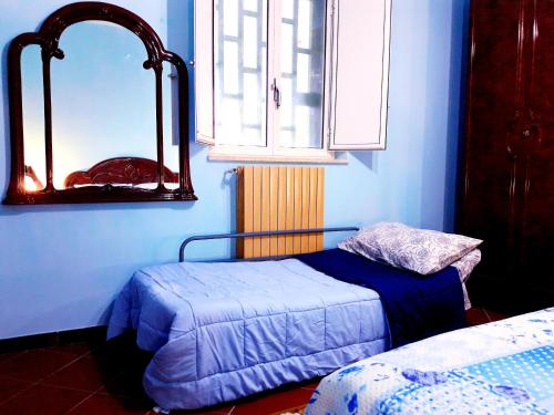 Postel nebo postele na pokoji v ubytování Villa Il Leccio - Trulli