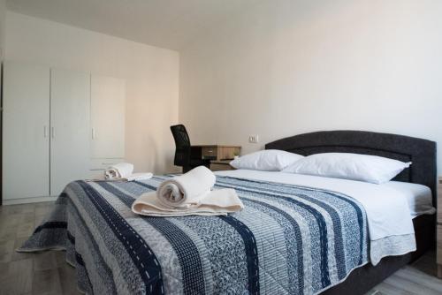 Postel nebo postele na pokoji v ubytování Apartments MARIO
