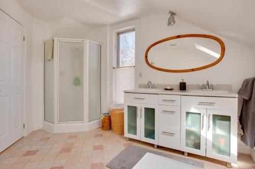 a bathroom with a sink and a mirror at Our Space the Perfect Place B&B in Picton