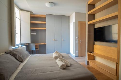 Postel nebo postele na pokoji v ubytování Chill in Tuscany