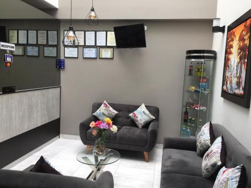 Posezení v ubytování Hostal Parisuite