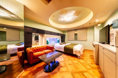 Postel nebo postele na pokoji v ubytování Hotel Luna Otsu (Adult Only)