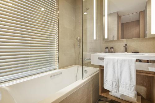 Koupelna v ubytování MD Hotel Doksan