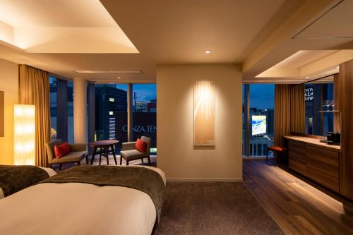 Ένα ή περισσότερα κρεβάτια σε δωμάτιο στο karaksa hotel premier Tokyo Ginza