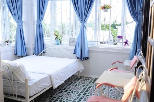 Katil atau katil-katil dalam bilik di Timothy Homestay Hue