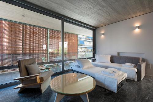 Ένα ή περισσότερα κρεβάτια σε δωμάτιο στο Athens BlueBuilding