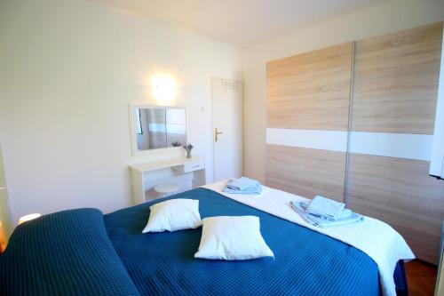 A bed or beds in a room at Apartment Agnese