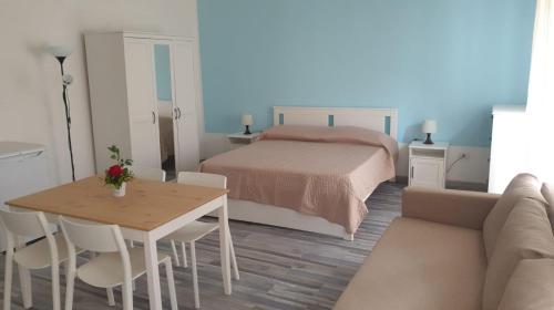 Postel nebo postele na pokoji v ubytování Lipari Suite Apartament