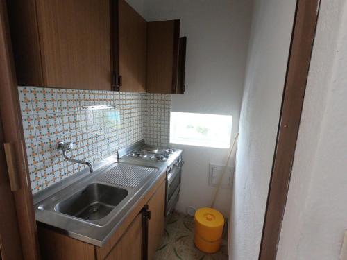 Kuchyň nebo kuchyňský kout v ubytování Residenza Gherly