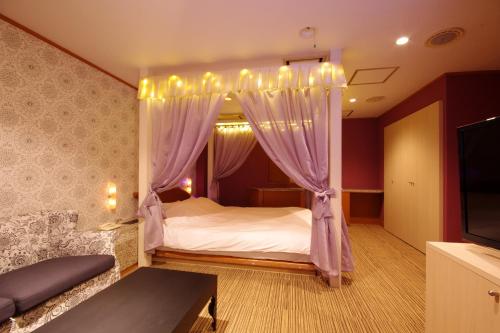 Katil atau katil-katil dalam bilik di Hotel Y's (Adult Only)
