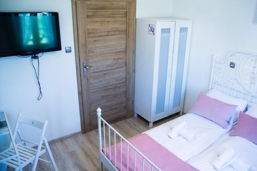 Postel nebo postele na pokoji v ubytování Harmony Hostel