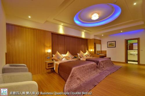 Zona de estar de Zheng Yi Classic Hotel & Motel