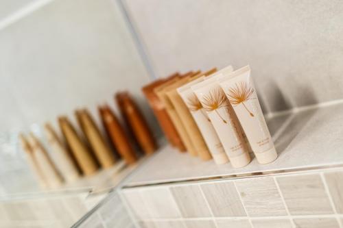 a row of books on a shelf in a refrigerator at Restaurace a penzion Pod Lipami Metylovice in Metylovice