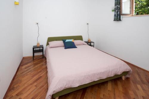 Postel nebo postele na pokoji v ubytování Mila Vila - Charming apartment near the sea
