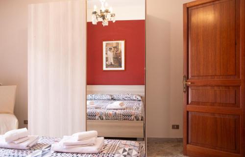 Giường trong phòng chung tại Villa Franca Mini Appartamenti