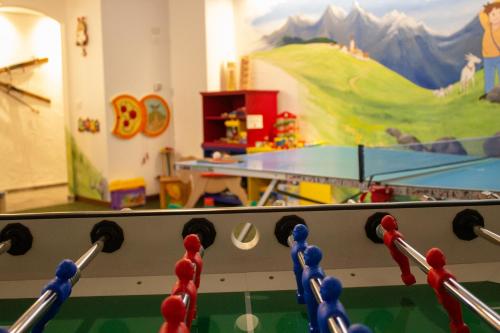 a toy ping pong table in a play room at Residence Lastè in Moena