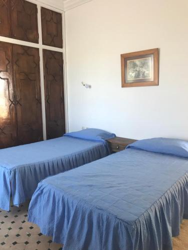 Postel nebo postele na pokoji v ubytování RIAD DES OISEAUX