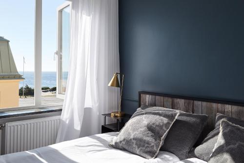 Säng eller sängar i ett rum på Varbergs Kusthotell